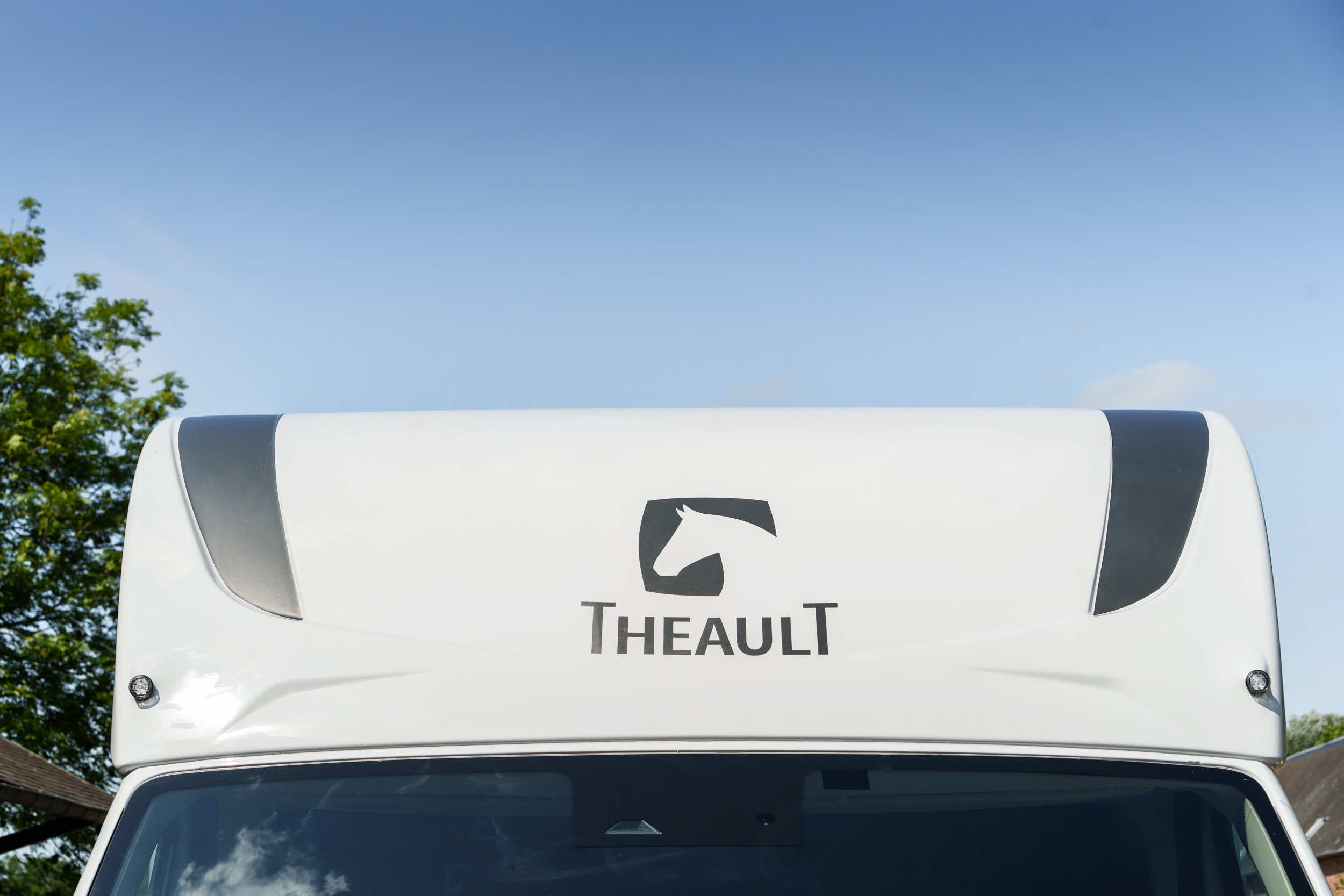 Front luton pod of a Theault XTEO horsebox showing the Theault logo
