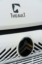 Front grille and chassis badge detail of a Theault XTEO horsebox