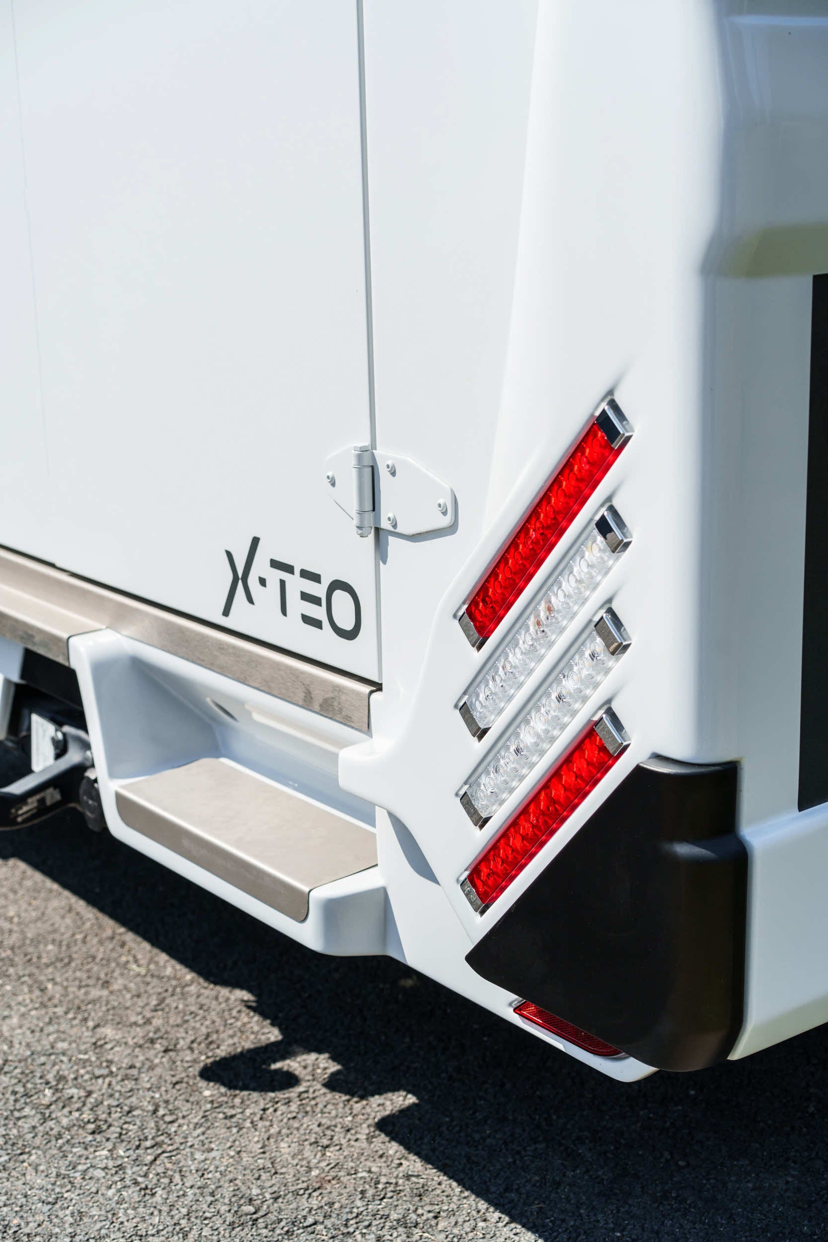 Rear corner of a Theault XTEO horsebox showing the XTEO badge and rear light cluster
