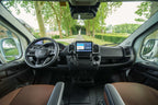 Cab interior of a Theault XTEO horsebox showing the dashboard, steering wheel and centre screen