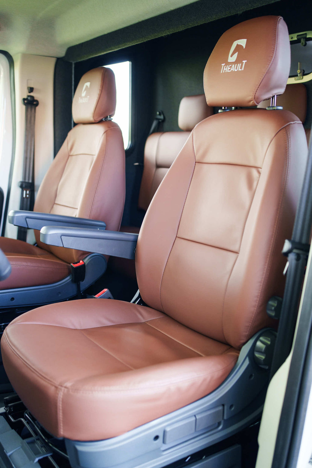 Tan leather seating inside the cab of a Theault XTEO horsebox