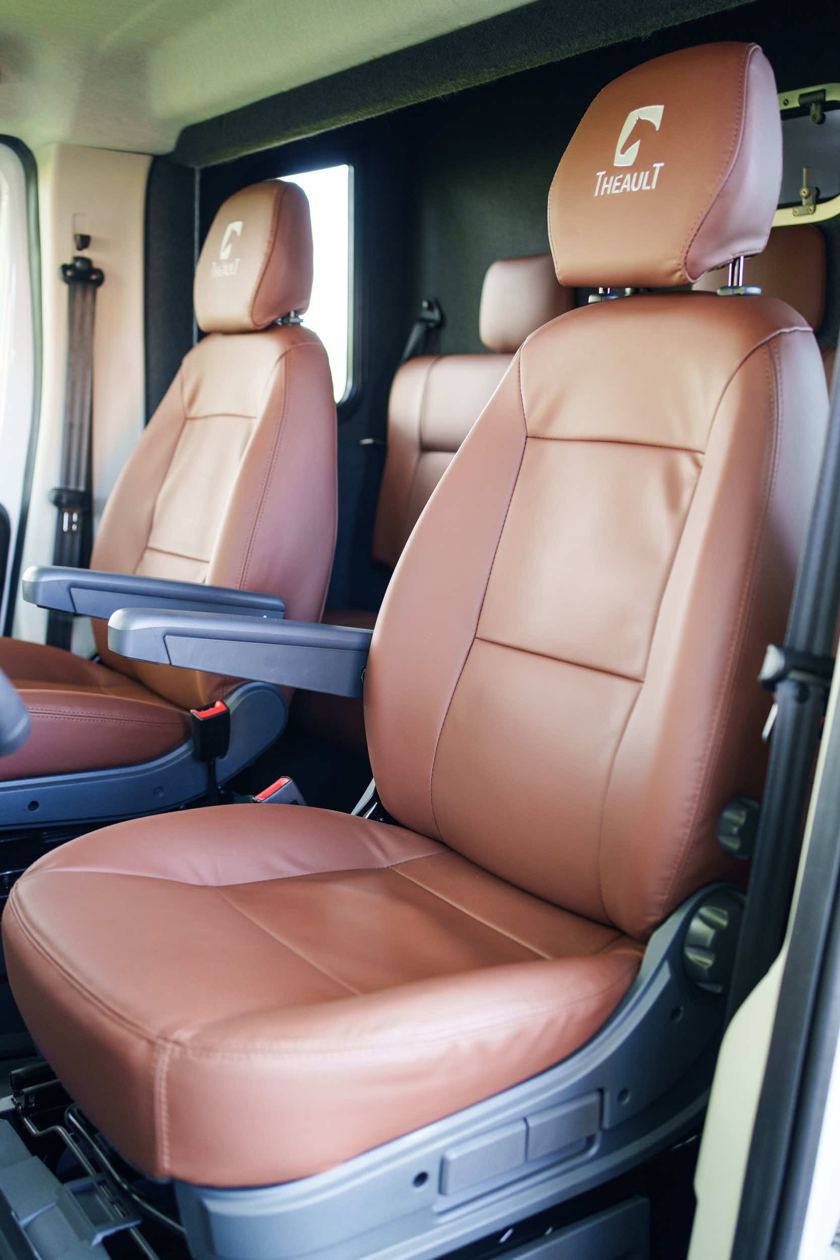 Tan leather seating inside the cab of a Theault XTEO horsebox