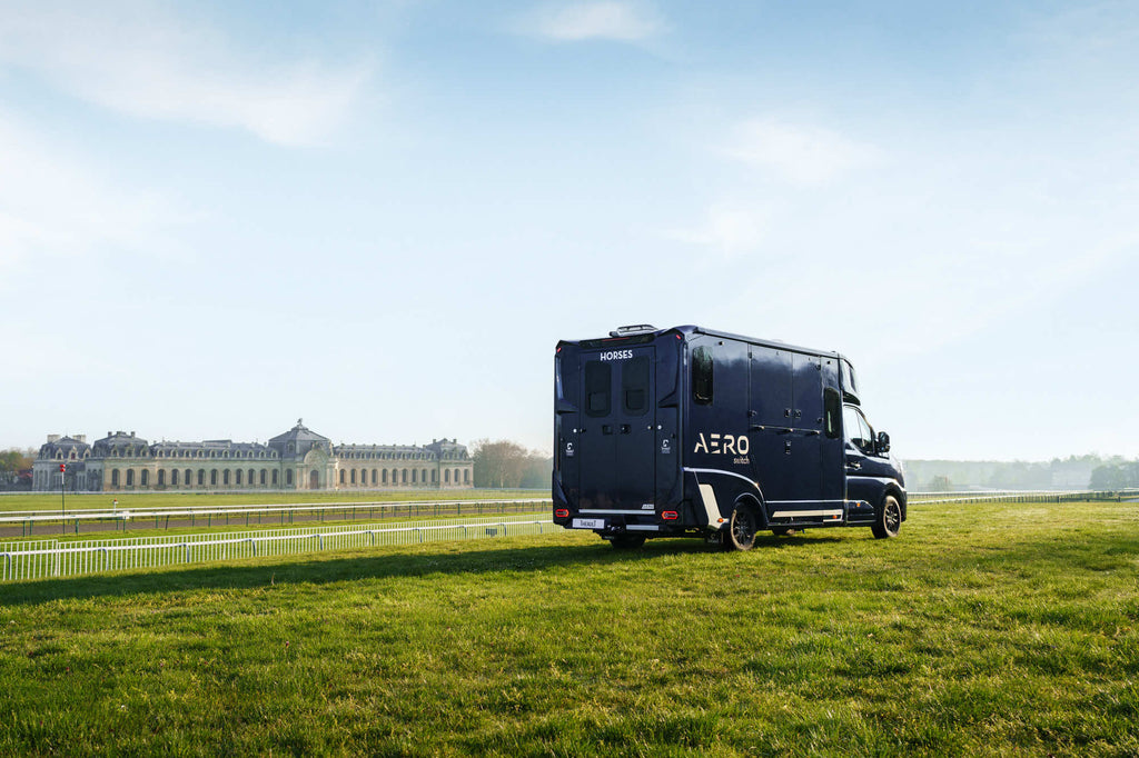 Rear three-quarter view of a Theault Aero Master horsebox outdoors