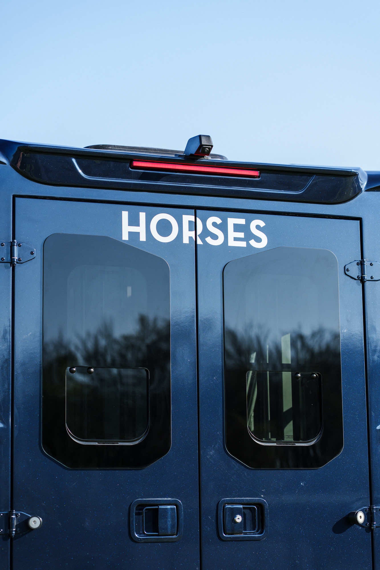 Rear doors of a Theault Aero Master horsebox with HORSES lettering
