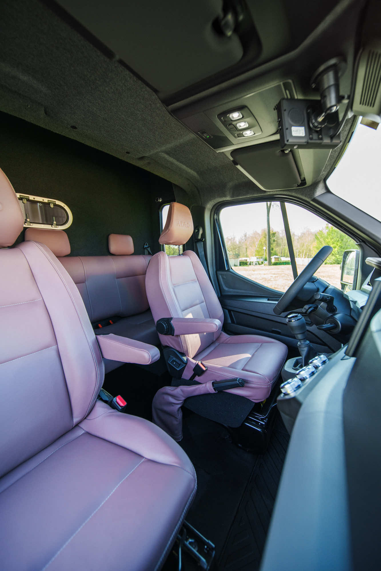 Interior seating and horse-area windows of a Theault Aero Master horsebox