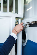Opening an exterior storage locker on a Theault Aero Sprinter horsebox