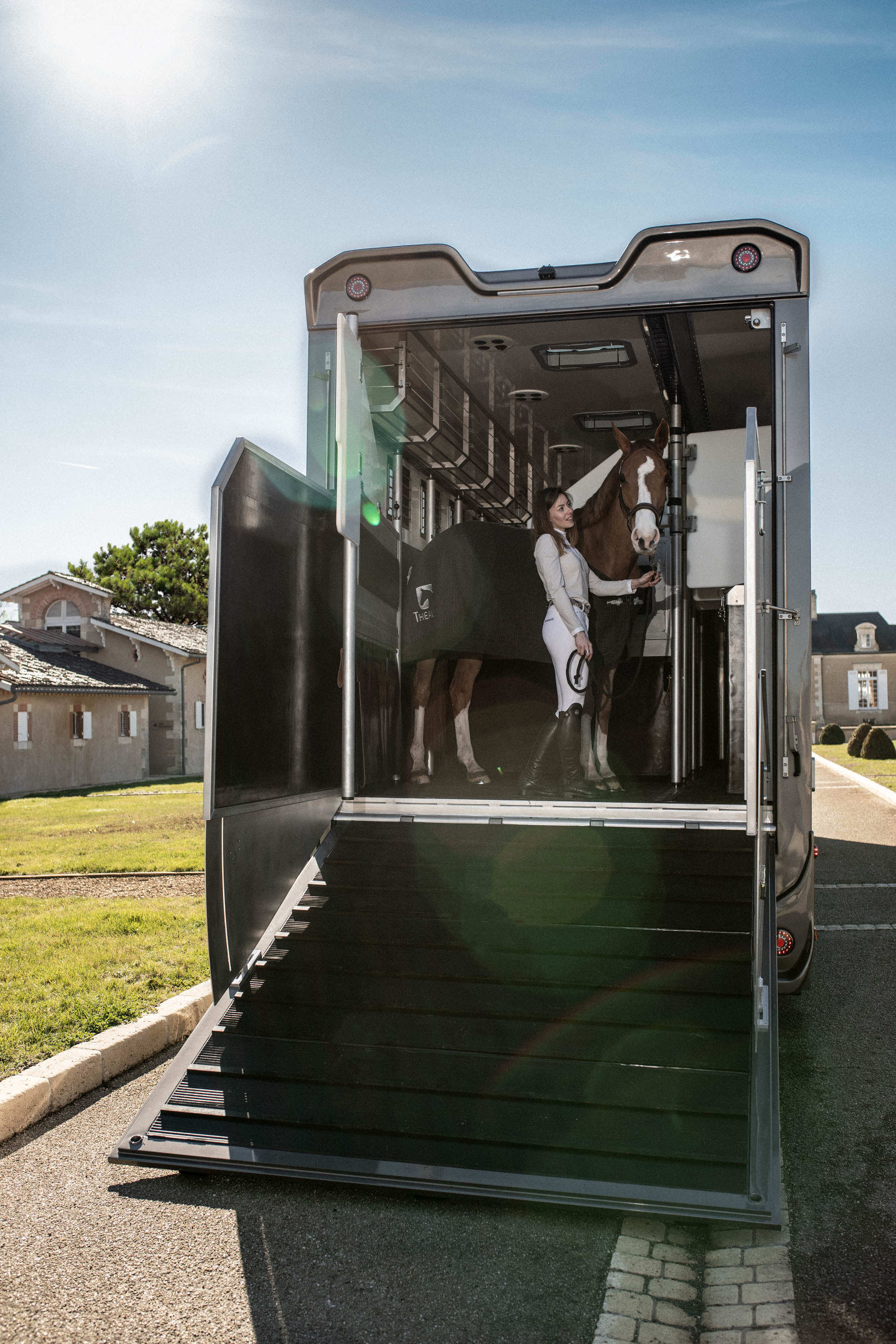 Theault Elegance horsebox with the rear ramp open and a horse loading