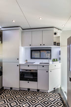 Kitchen area inside the living quarters of a Theault Elegance horsebox