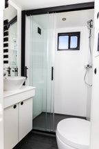 Lounge and shower room interior of a Theault Elegance horsebox