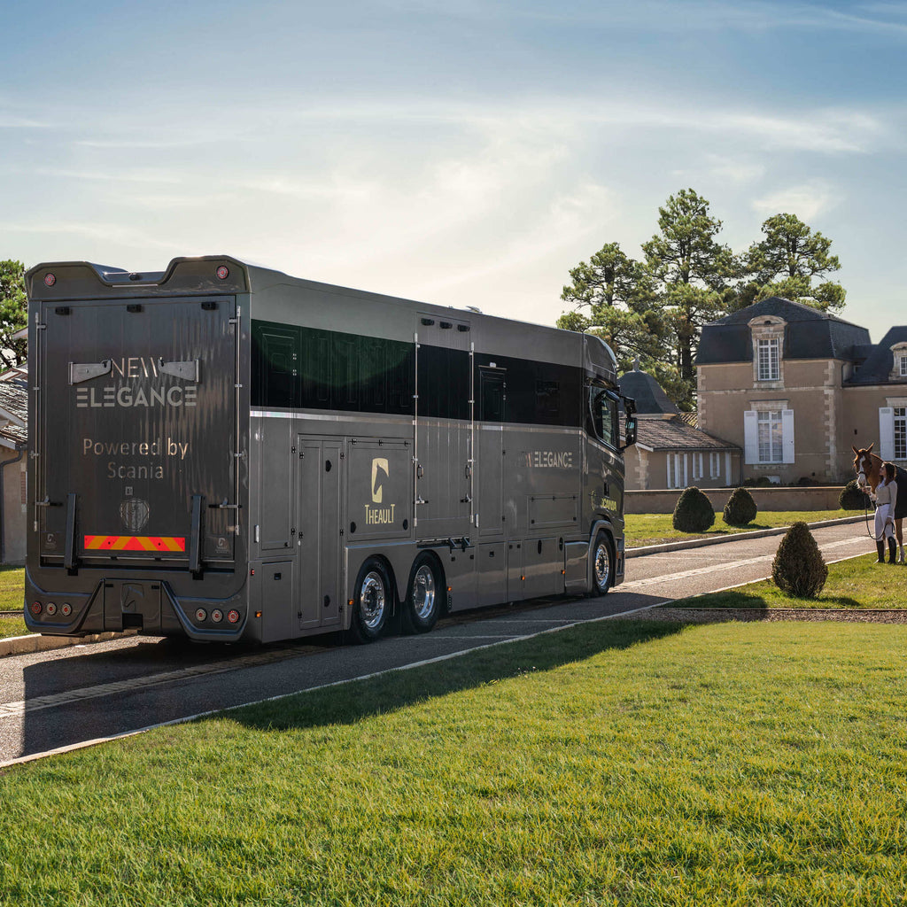 Rear view of a Theault Elegance horsebox parked with the ramp closed