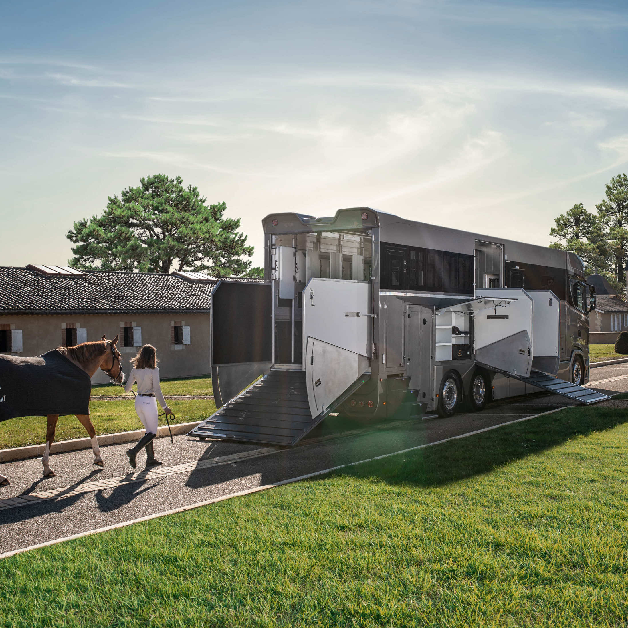 Theault Elegance horsebox with the ramp down and a horse alongside